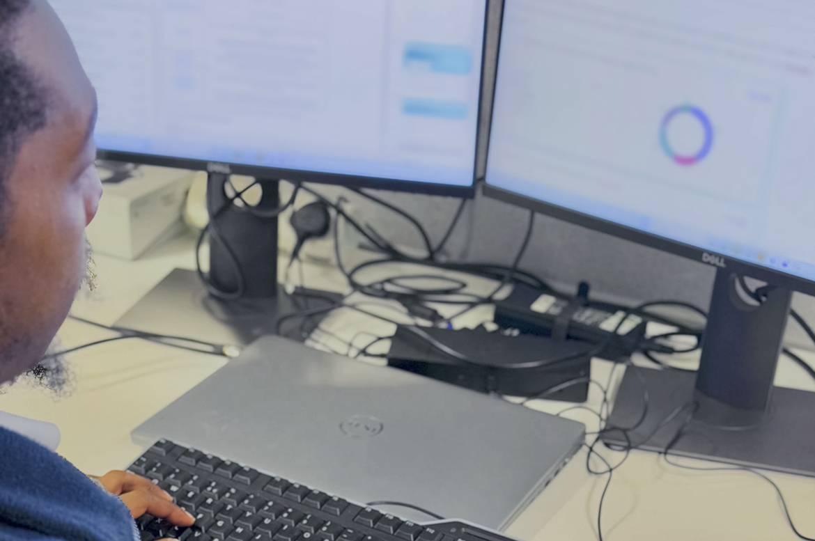 Colleague at computer screen