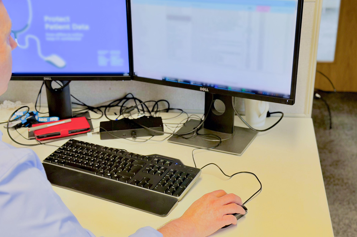 Colleague at computer