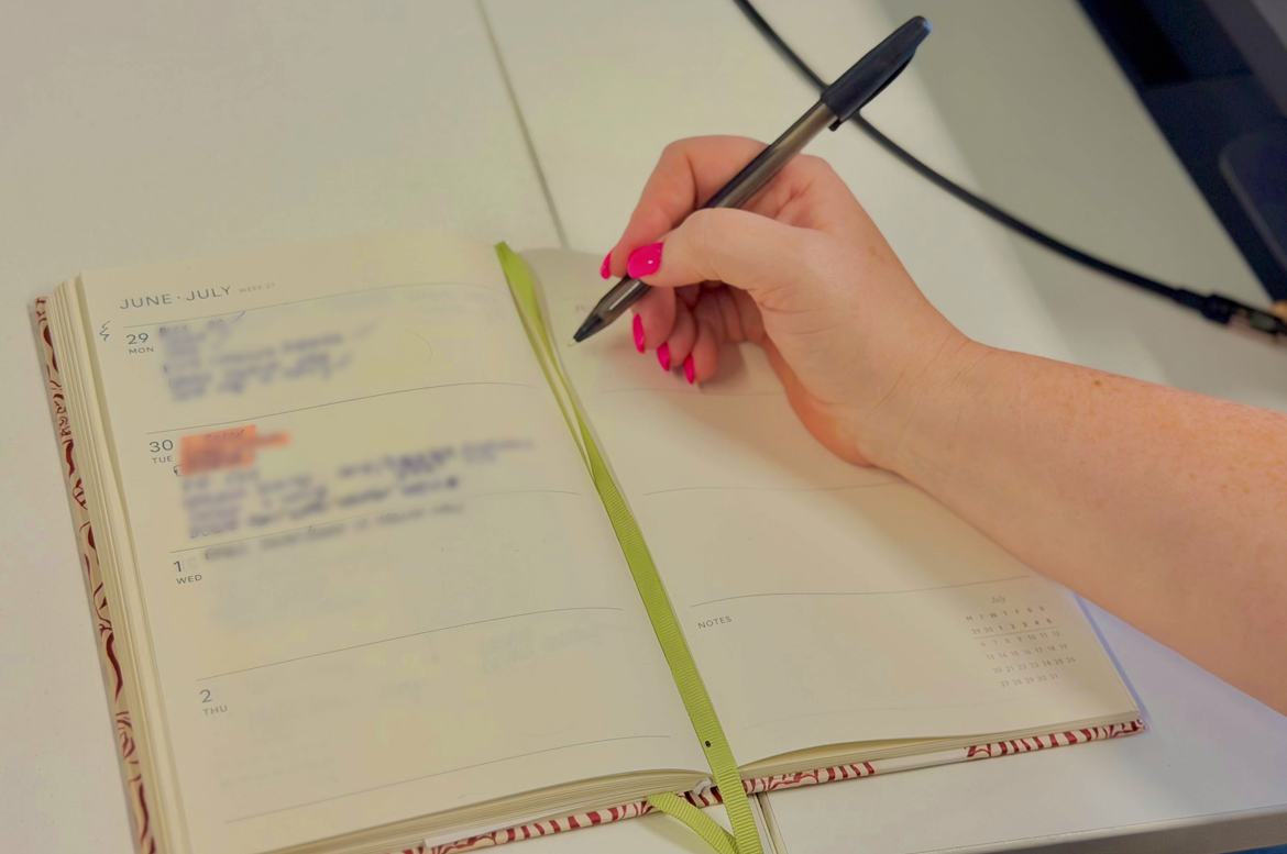 Colleague taking notes